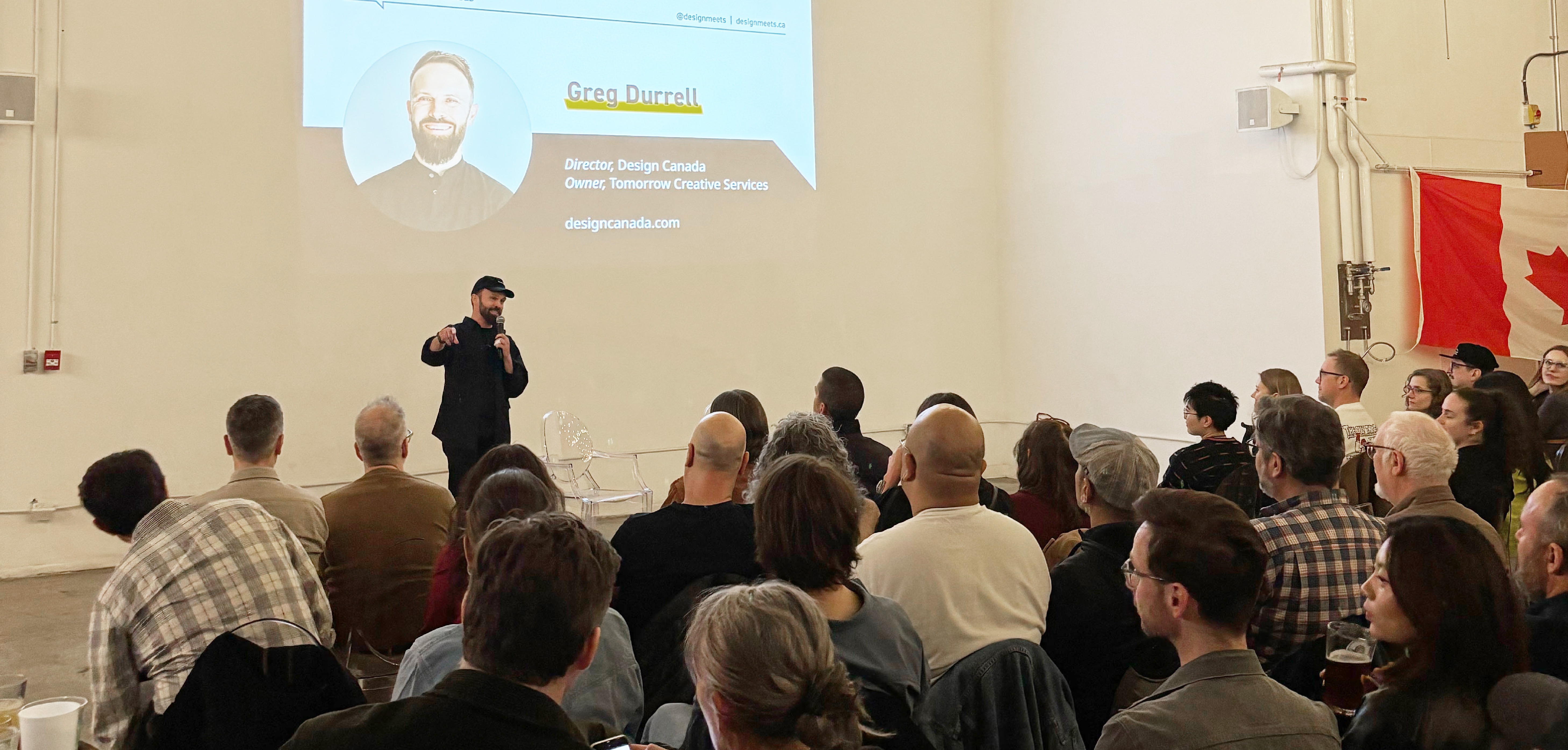 Greg Durrell speaking to the audience.